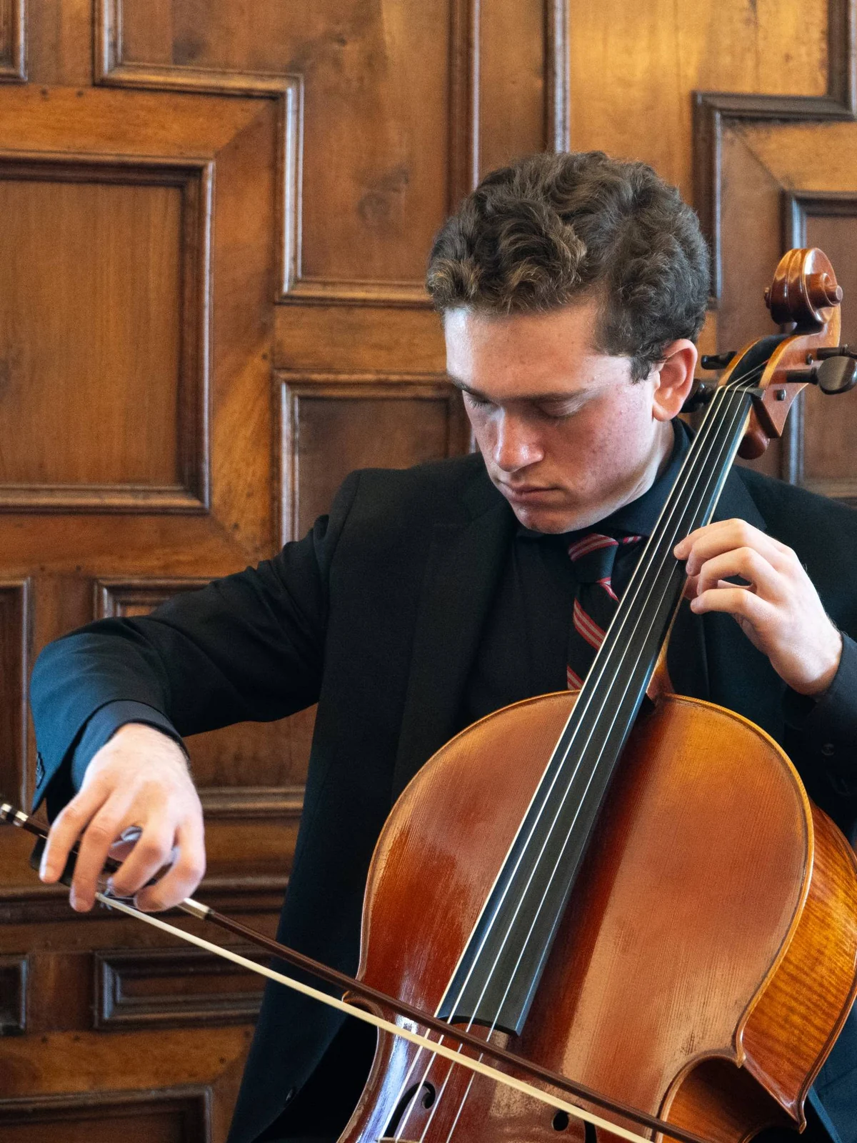 Oren playing the cello